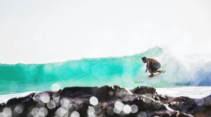 man-surfing-painting